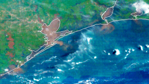 Clouds moving along the coastline viewed from space.